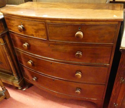 Lot 1401 - A Regency mahogany bowfront chest of two short...