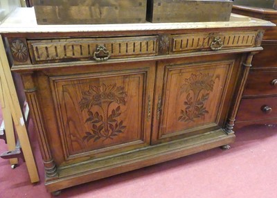 Lot 1403 - A circa 1900 French relief carved oak dresser...