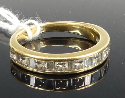 Lot 421 - A modern 18ct gold diamond set half eternity...