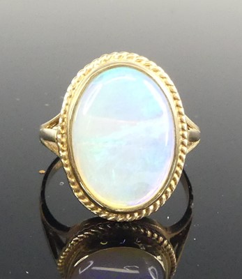 Lot 429 - A modern 9ct gold opal set dress ring, the...