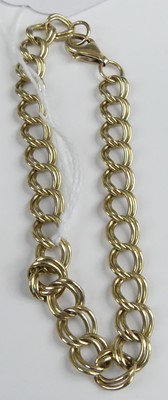 Lot 462 - A modern 9ct gold double curblink bracelet,...