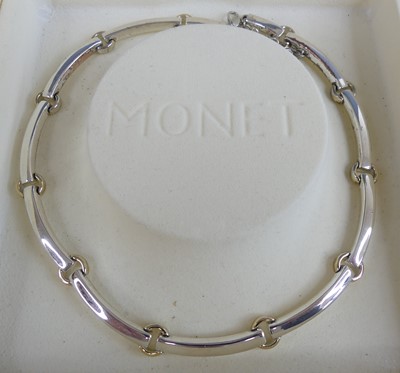 Lot 475 - A Monet polished metal sectional choker, in...