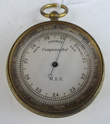 Lot 480 - A gilt metal cased pocket barometer, having...