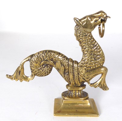 Lot 567 - A cast brass figure of a Venetian seahorse, on...