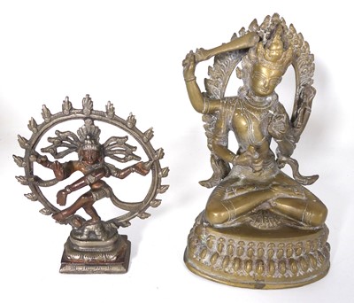 Lot 576 - An Indian brass figure of Shiva modelled...