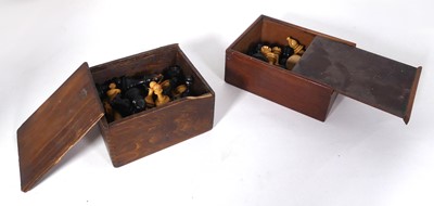 Lot 581 - A turned ebony and boxwood chess set, in the...