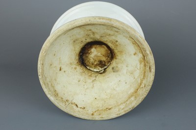 Lot 2023 - A pair of Chinese blue and white candle stands,...