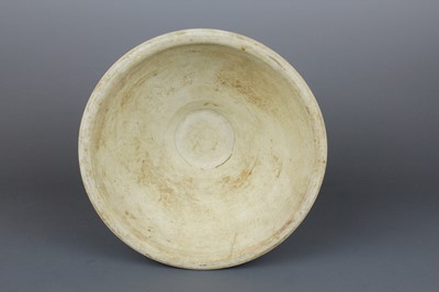 Lot 2023 - A pair of Chinese blue and white candle stands,...