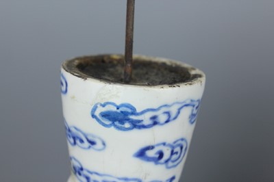 Lot 2023 - A pair of Chinese blue and white candle stands,...