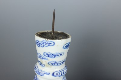 Lot 2023 - A pair of Chinese blue and white candle stands,...