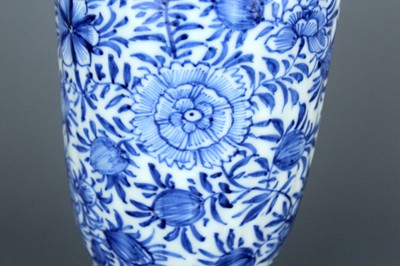 Lot 2037 - A Chinese blue and white tall beaker vase,...