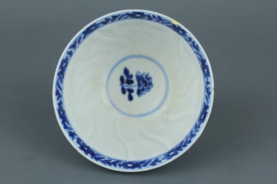 Lot 2043 - A near pair of Chinese blue and white cups,...