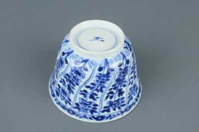 Lot 2043 - A near pair of Chinese blue and white cups,...