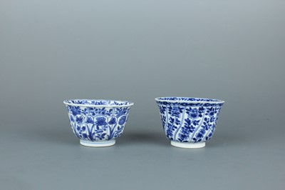 Lot 2043 - A near pair of Chinese blue and white cups,...