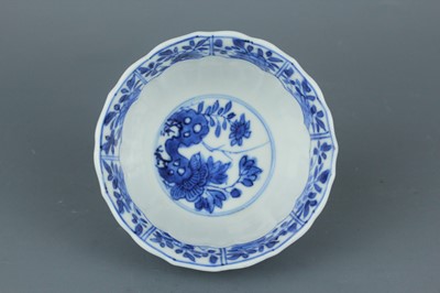 Lot 2043 - A near pair of Chinese blue and white cups,...