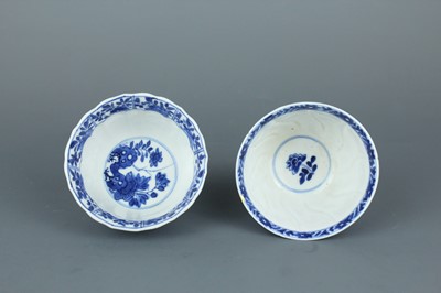 Lot 2043 - A near pair of Chinese blue and white cups,...