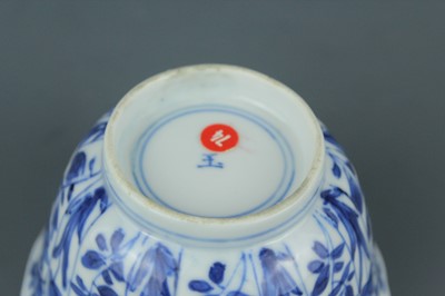 Lot 2043 - A near pair of Chinese blue and white cups,...