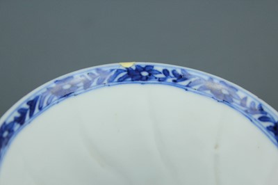 Lot 2043 - A near pair of Chinese blue and white cups,...