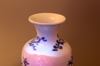Lot 2038 - A small Chinese blue and white sleeve vase,...