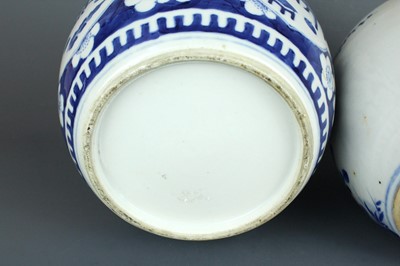 Lot 2025 - Two Chinese blue and white jars with covers,...
