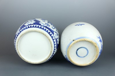 Lot 2025 - Two Chinese blue and white jars with covers,...
