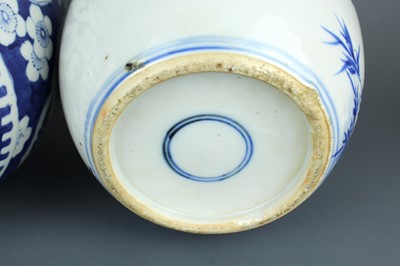 Lot 2025 - Two Chinese blue and white jars with covers,...