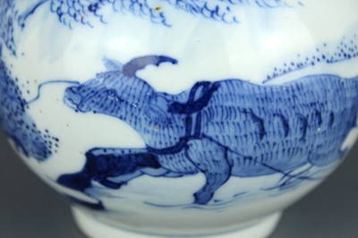 Lot 2027 - A Chinese blue and white “ox” bottle vase,...