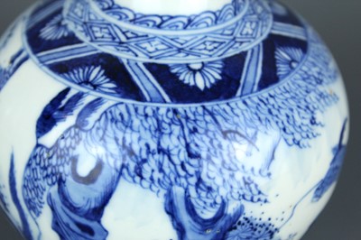 Lot 2027 - A Chinese blue and white “ox” bottle vase,...