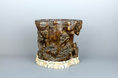 Lot 2087 - A Chinese wood-carved landscape brush pot,...