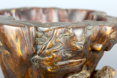 Lot 2087 - A Chinese wood-carved landscape brush pot,...