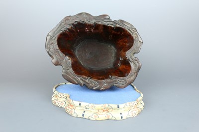 Lot 2087 - A Chinese wood-carved landscape brush pot,...
