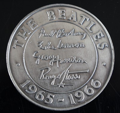 Lot 692 - The Beatles, a 1966 silver medal, obv:...