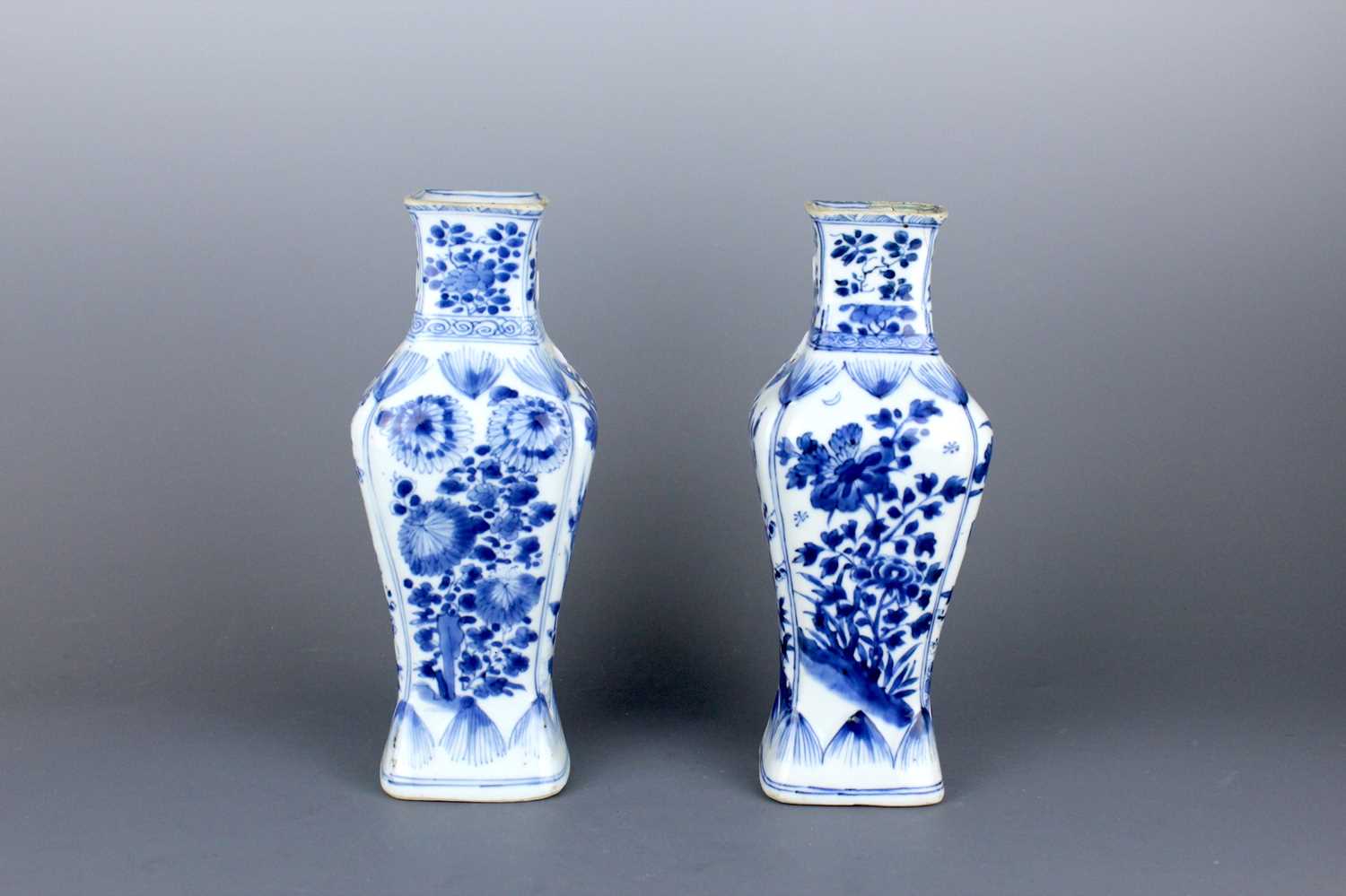 Lot 2040 - A pair of Chinese blue and white square vases,...