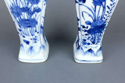 Lot 2040 - A pair of Chinese blue and white square vases,...
