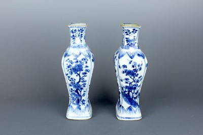 Lot 2040 - A pair of Chinese blue and white square vases,...