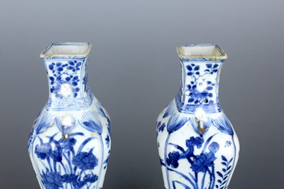 Lot 2040 - A pair of Chinese blue and white square vases,...
