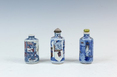Lot 2001 - Three Chinese underglaze blue and red snuff...