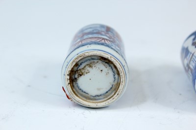 Lot 2001 - Three Chinese underglaze blue and red snuff...