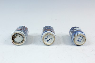 Lot 2001 - Three Chinese underglaze blue and red snuff...