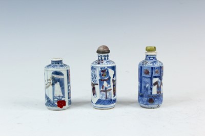 Lot 2001 - Three Chinese underglaze blue and red snuff...
