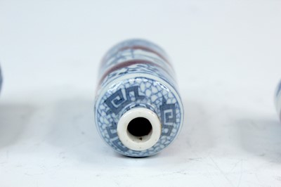 Lot 2002 - Three Chinese underglaze blue and red snuff...