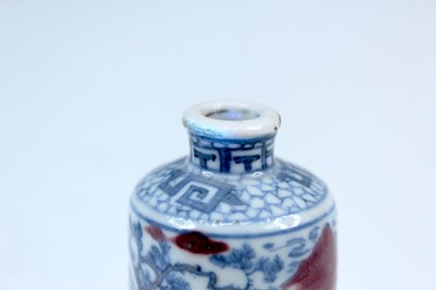 Lot 2002 - Three Chinese underglaze blue and red snuff...