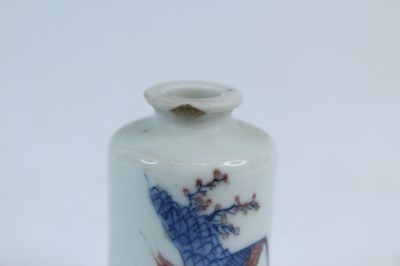 Lot 2002 - Three Chinese underglaze blue and red snuff...