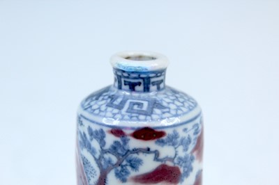 Lot 2002 - Three Chinese underglaze blue and red snuff...