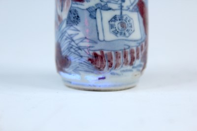 Lot 2002 - Three Chinese underglaze blue and red snuff...