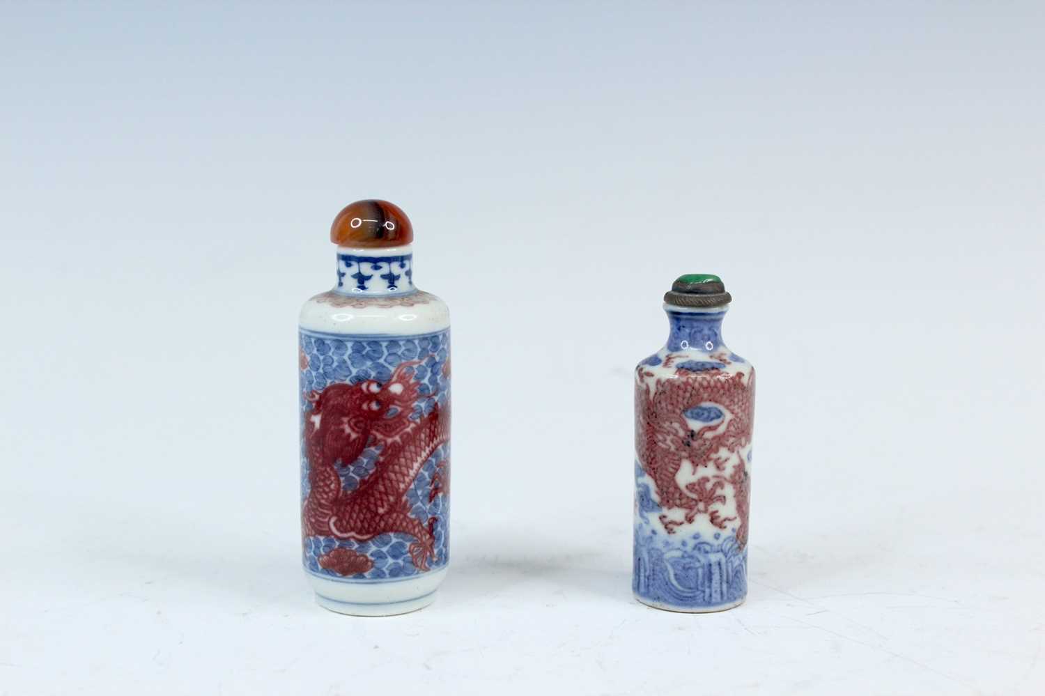 Lot 2003 - Two Chinese underglaze blue and red snuff...