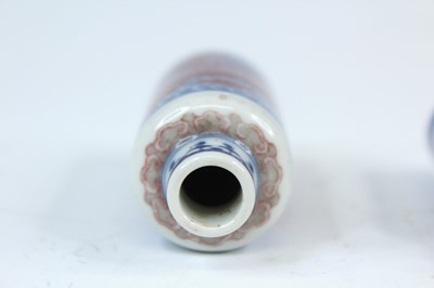 Lot 2003 - Two Chinese underglaze blue and red snuff...