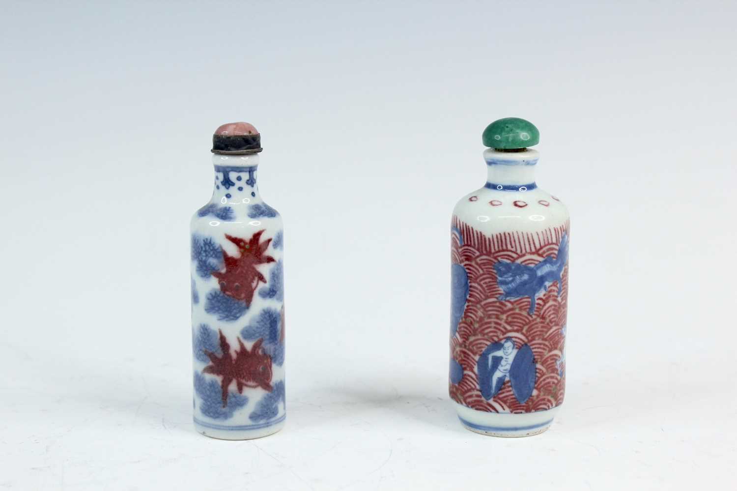 Lot 2006 - Two Chinese underglaze blue and red snuff...