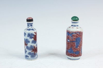 Lot 2006 - Two Chinese underglaze blue and red snuff...