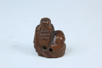 Lot 2233 - Six Japanese wood netsuke of seated figures,...